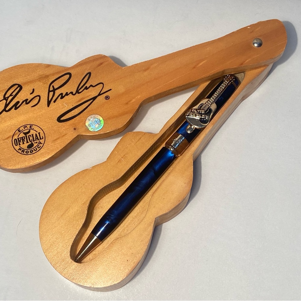 Elvis Presley collection pen with guitar-shaped wooden box.